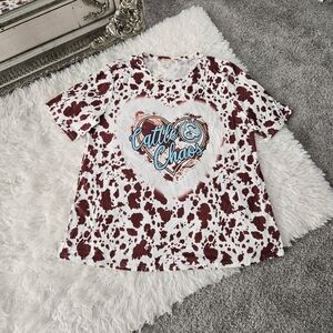 Southern Stitch "Cattle & Chaos" cow print top. Size XL. New.